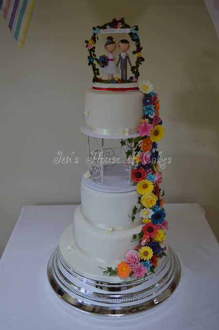Rainbow Flower Cascade Wedding Cake (topper provided by bride)